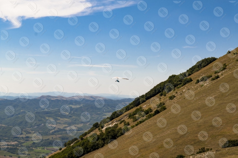 park Monte Cucco hang glider sport fly view landscape hills mountains sky  Eugubino - Altochiascio