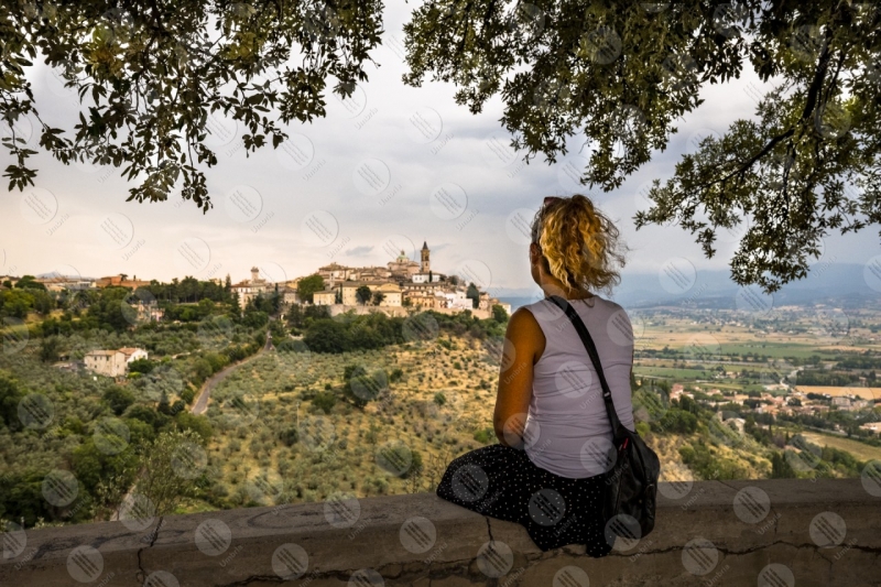 historical centre view landscape hills woman sky trees  Trevi