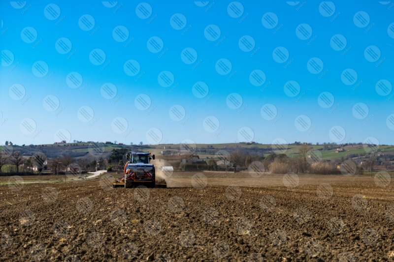 agriculture field tractor work countryside sky clear sky panorama  Umbria