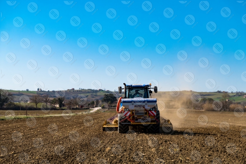 agriculture field tractor work countryside sky clear sky  Umbria