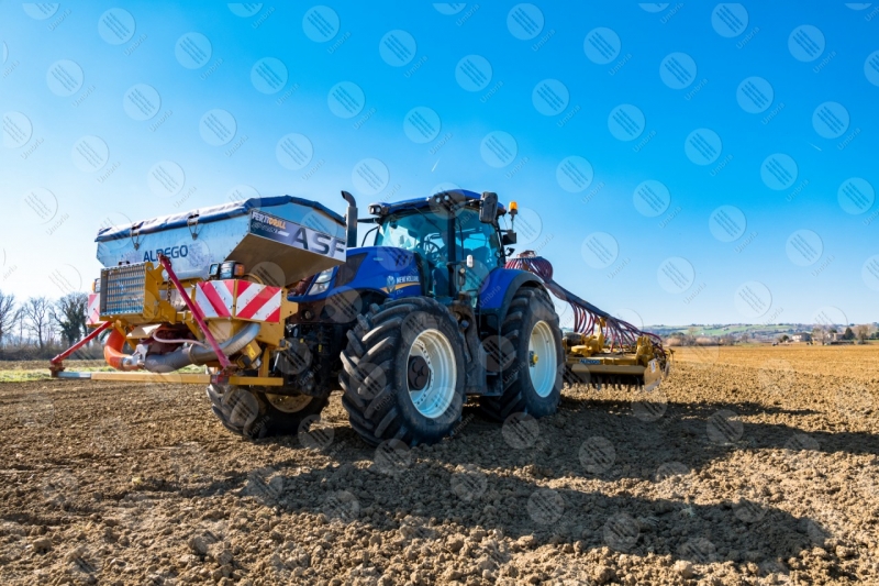 agricolture field tractor work countryside sky clear sky  Umbria